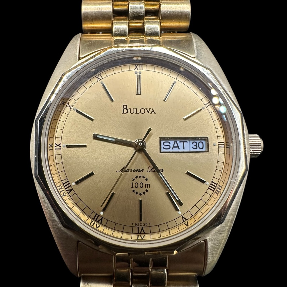 Bulova Gold Tone Marine Star with Day-Date Display. New old stock.